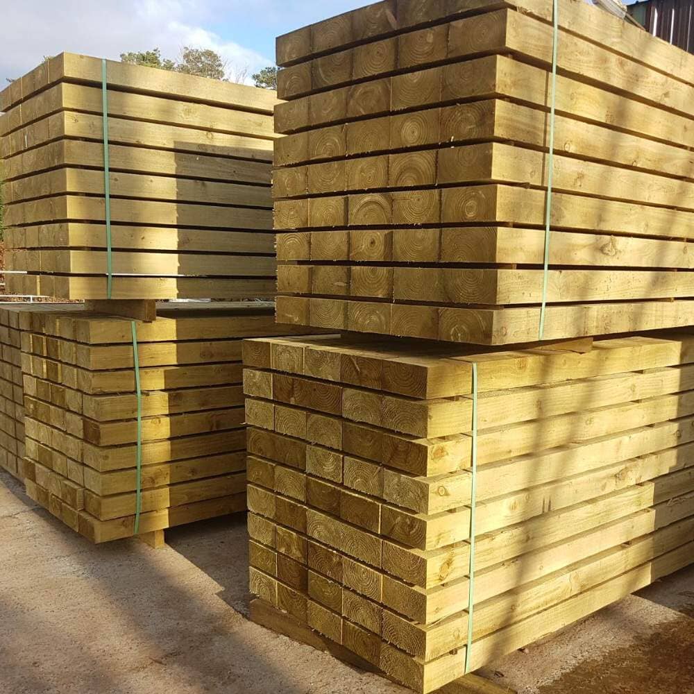 Pressure-treated garden sleeper 2.4m x 200mm x 100mm timber for retaining walls or raised beds.