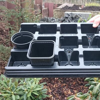 Carry tray for 9cm round and square pots plant transport.