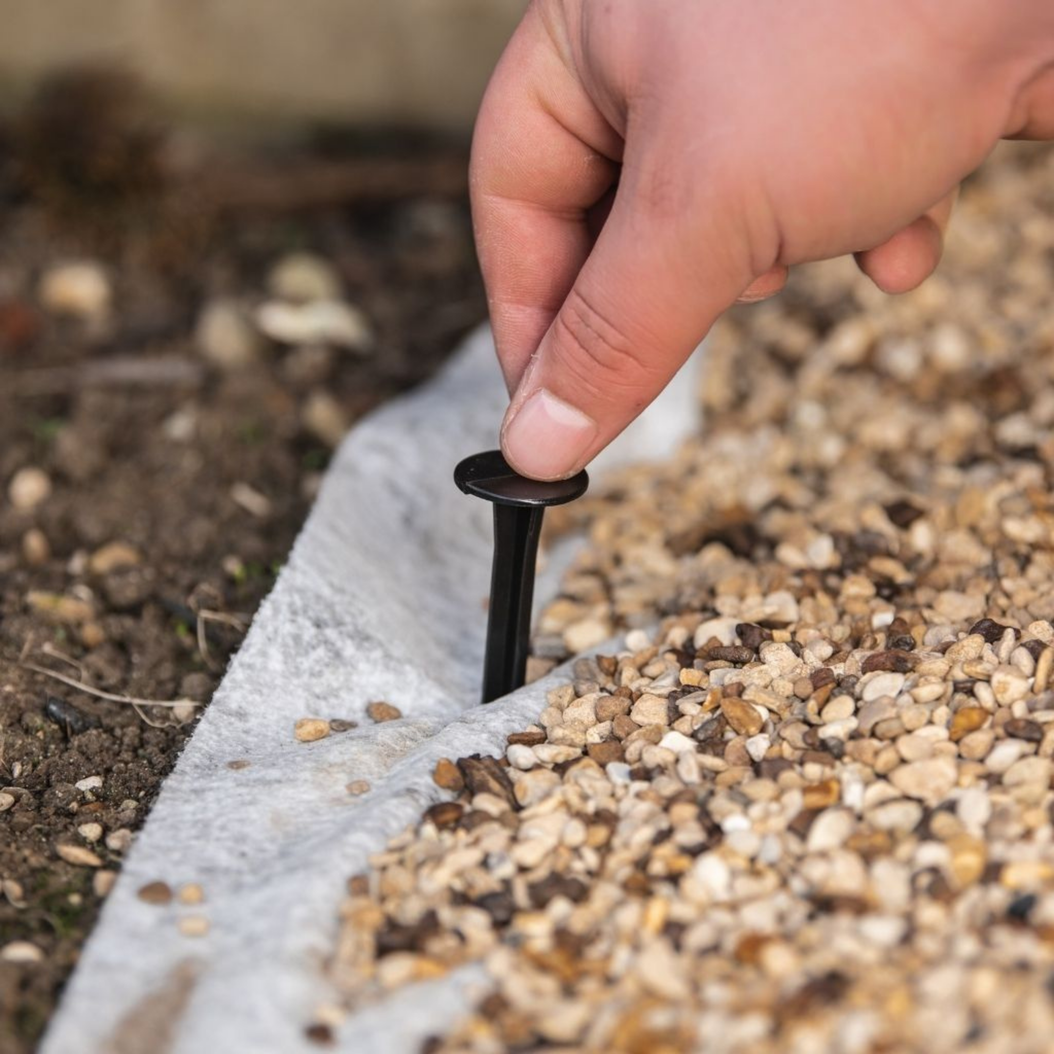 Garden fabric peg 15cm for securing landscaping fleece or membrane edge anchoring.