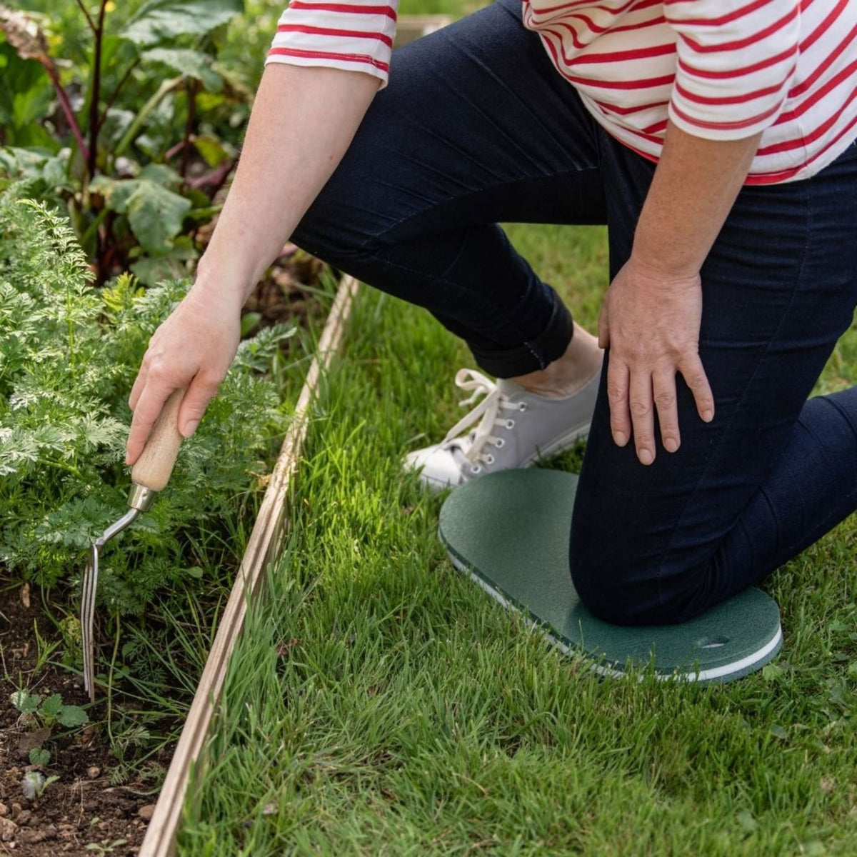Garden kneeler pad standard size for knee protection while gardening.