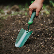 Hand trowel for bulb planting and soil preparation.