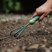 Hand cultivator 3 prong for soil loosening and aeration gardening tasks.